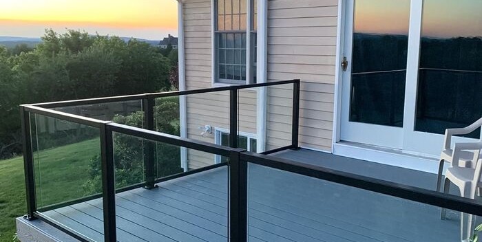 Skyline Framed Glass Railing gives your deck a modern, clean look with glass railing.
