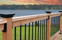 wooden deck with black post caps