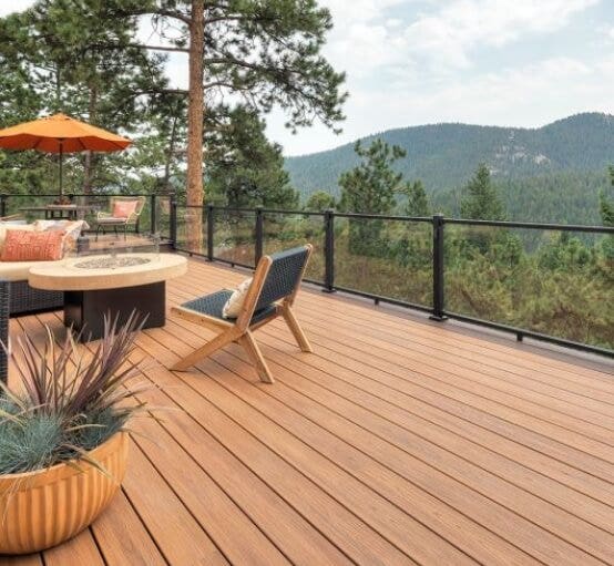 A deck is shown utilizing Trex composite railing.